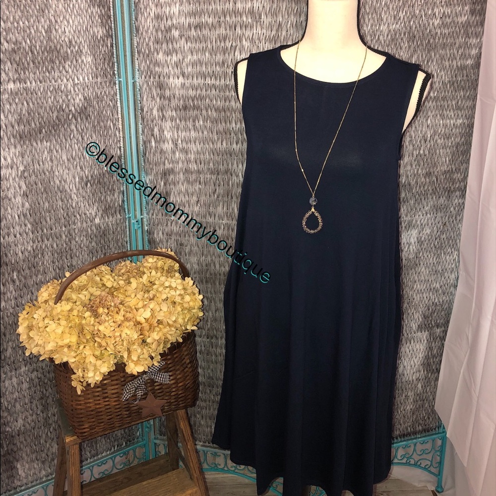 COPY - Sleeveless Flared dress with side pockets